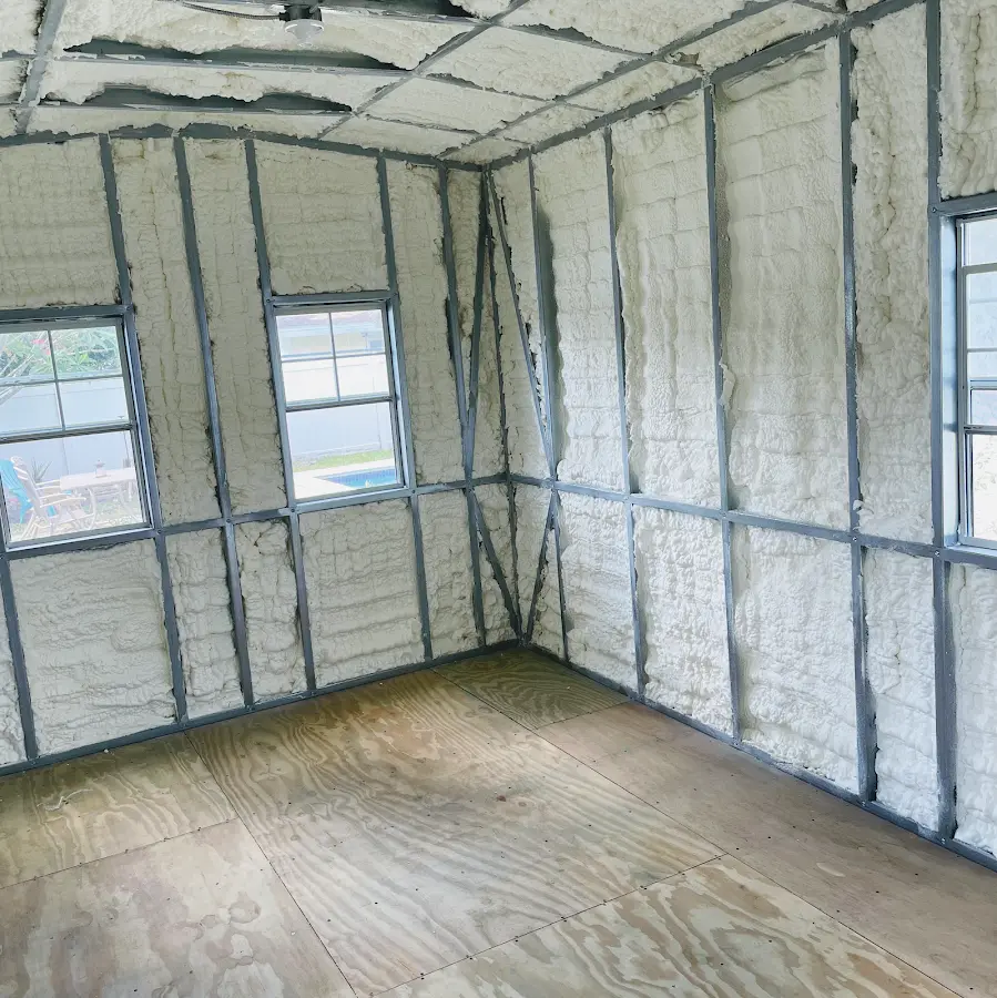 Closed-cell spray foam insulation applied to wall cavities in a residential project in Weymouth Town